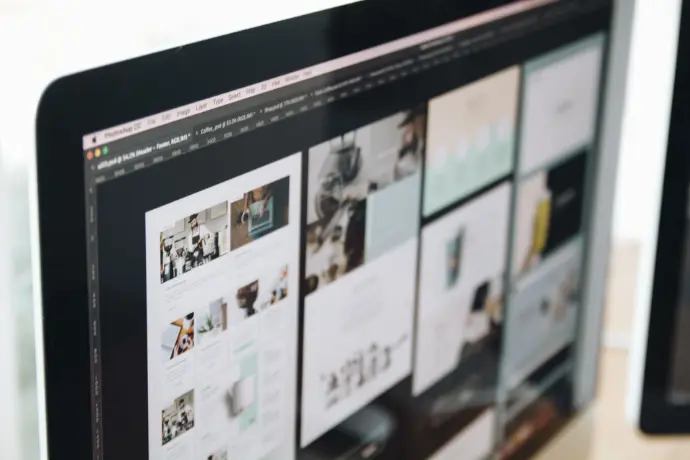 Web page layouts displayed on a desktop monitor